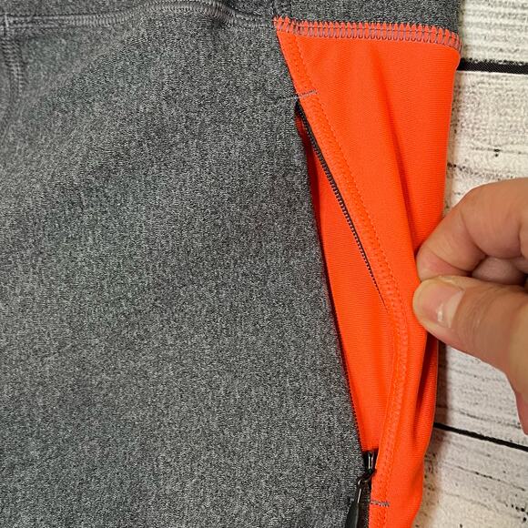 Under Armour Women's Legging Size Medium Gray/Corral Stretch Side Hem Zipper - Picture 10 of 10